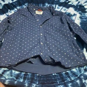 Blue long sleeve button up collard shirt